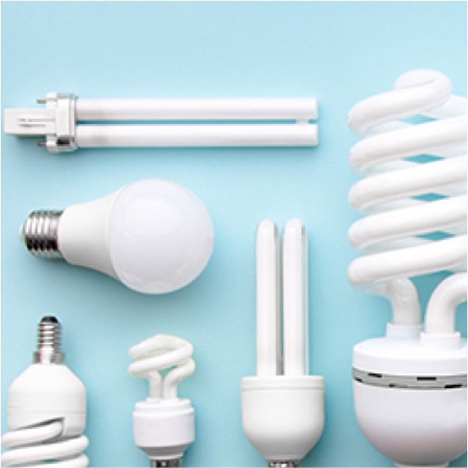 LED, Halogen, Flourescent and CFL light bulbs on a blue background. Links to where to buys light bulbs on justdealsstore.com